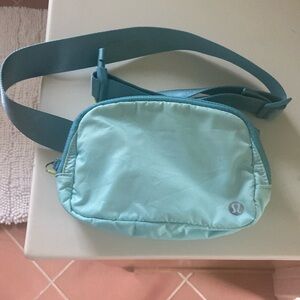 Belt bag turquoise back zipper adjustable strap